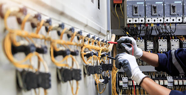 Professional Electrician technician working in Bells, TX